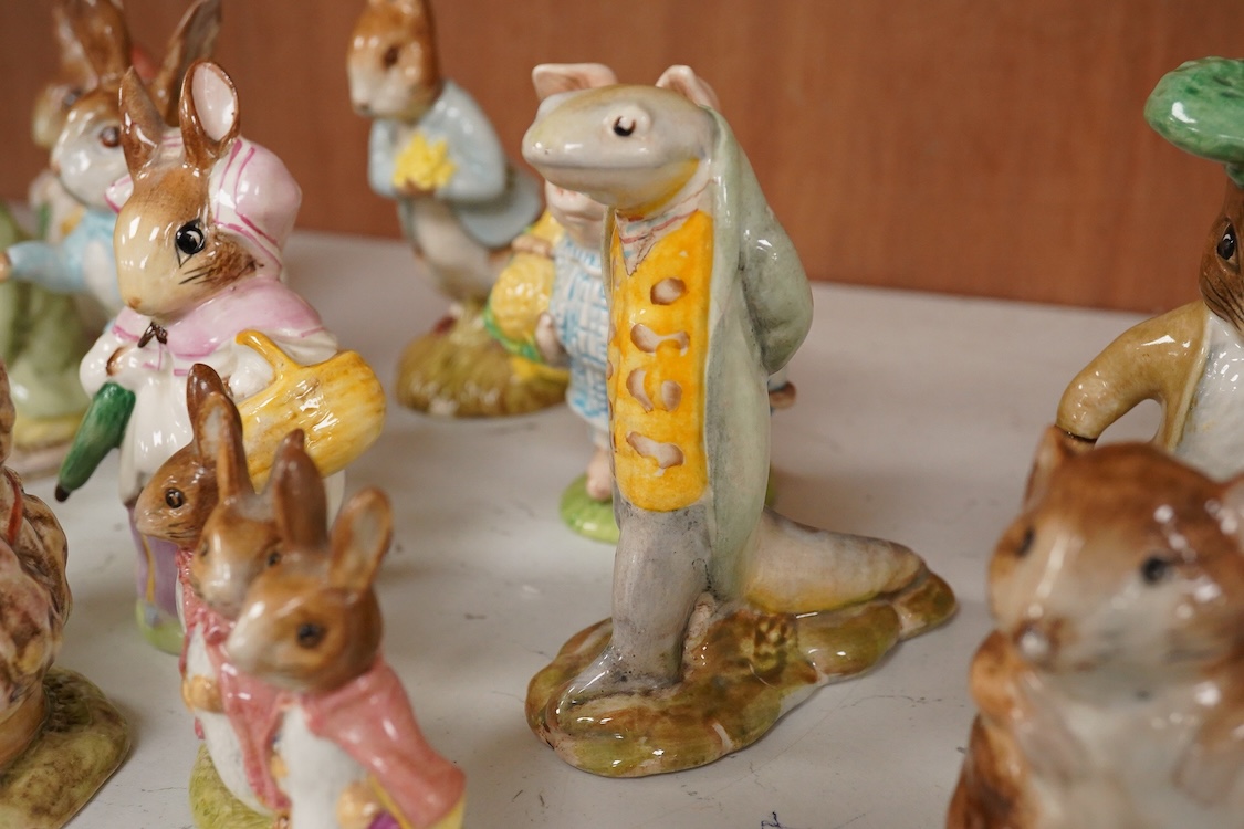 Twenty Beatrix Potter figures, mostly later production figures, largest 11cm high